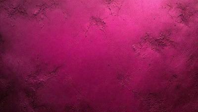 The primary subject of the image is a pink wall with a textured surface. The setting is a room with a pink background. The visual style is a close-up of the wall, showcasing its texture and color. The dominant colors are pink, and the overall atmosphere is warm and inviting.