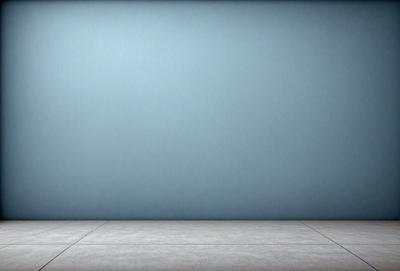 The primary subject of the image is a large, empty room with a blue wall. The setting is a room with a blue wall, and the visual style is a photo. The colors and mood of the image are predominantly blue, creating a calm and serene atmosphere.
