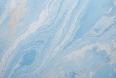 The primary subject of the image is a blue and white marbled wall. The setting is a room with a blue and white marbled wall as the main focus. The visual style is a photo of the marbled wall. The dominant colors are blue and white, creating a calm and soothing atmosphere.