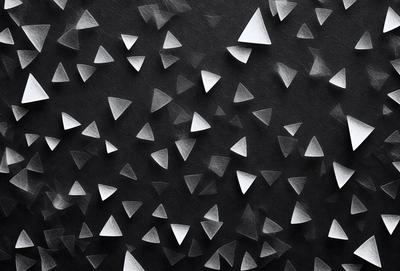 The primary subject of the image is a pattern of white triangles on a black background. The setting is a black surface, and the visual style appears to be a combination of a photo and digital art. The dominant colors are black and white, creating a bold and striking pattern. The overall atmosphere of the image is modern and minimalist.