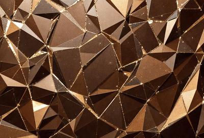 The primary subject of the image is a close-up of a gold-colored wallpaper with a geometric pattern. The setting is a room with a brown wall, and the visual style appears to be a combination of a photo and digital art. The dominant colors are gold and brown, creating a warm and luxurious atmosphere.
