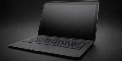 The primary subject of the image is a laptop computer. The laptop is sitting on a black surface, which could be a table or a desk. The visual style of the image is a photo, capturing the laptop in a close-up view. The colors and mood of the image are dark and moody, with the laptop's screen being black and the overall atmosphere appearing somewhat ominous.