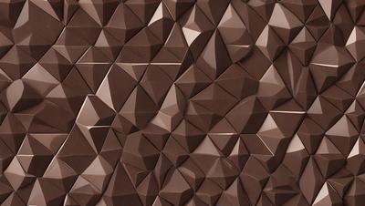 The primary subject of the image is a brown wall with a pattern of triangles. The setting is a room with a brown wall, and the visual style appears to be a combination of a photo and digital art. The dominant colors are brown and beige, creating a warm and earthy atmosphere.