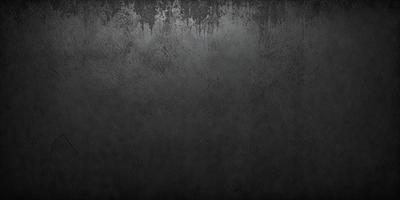 The primary subject of the image is a black and white photo of a wall. The setting is a dark room, and the visual style is a close-up of the wall. The colors and mood of the image are predominantly dark and moody, with the black and white color scheme adding to the atmosphere.