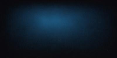 The primary subject of the image is a blue sky with a few clouds. The setting is a dark, starry night, creating a dramatic contrast between the bright blue sky and the darkness of the night. The visual style is a photo, capturing the beauty of the night sky. The colors and mood of the image are predominantly dark, with the blue sky and the few clouds providing a touch of brightness and contrast.
