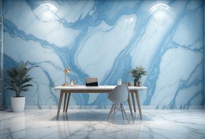 The primary subject of the image is a white desk with a laptop on it, placed in front of a blue marble wall. The setting is a modern office space, and the visual style is a realistic photo. The colors and mood of the image are predominantly white and blue, creating a clean and professional atmosphere.