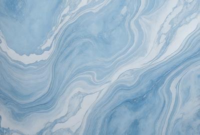 The primary subject of the image is a blue and white marbled wall. The setting is a room with a blue and white marbled wall as the main focus. The visual style is a close-up of the marbled wall, showcasing its intricate patterns. The colors and mood of the image are predominantly blue and white, creating a calm and serene atmosphere.