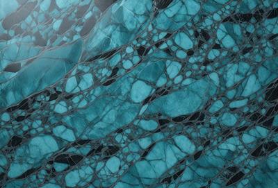 The primary subject of the image is a blue and white patterned surface, which appears to be a piece of art or a textured wall. The setting is a dark room, and the visual style is a close-up of the artwork. The dominant colors are blue and white, creating a calm and serene atmosphere.