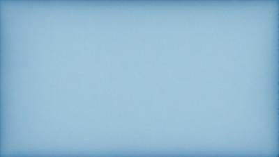 The primary subject of the image is a clear blue sky. The setting is a vast, open space with no visible landmarks or objects. The visual style is a natural, outdoor scene. The colors and mood are predominantly blue, creating a calm and serene atmosphere.