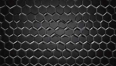 The primary subject of the image is a close-up of a black and white patterned surface, which appears to be a textured wall or a black and white honeycomb pattern. The setting is a dark room, and the visual style is a close-up of the pattern. The dominant colors are black and white, creating a moody and dramatic atmosphere.