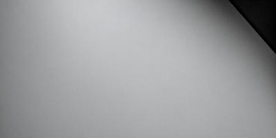 The primary subject of the image is a white wall. The setting is a room with a white wall, and the visual style is a photo. The colors and mood of the image are predominantly white, giving it a clean and minimalist appearance.