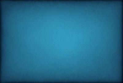 The primary subject of the image is a large, empty blue sky. The setting is a vast, open space with no visible landmarks or objects. The visual style is a natural, outdoor scene with a focus on the sky. The colors and mood are predominantly blue, creating a calm and serene atmosphere.