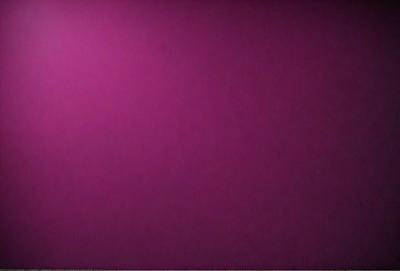 The primary subject of the image is a large, purple wall. The setting is a room with a purple background, and the visual style is a close-up of the wall. The dominant colors in the image are purple, and the overall atmosphere is calm and serene.