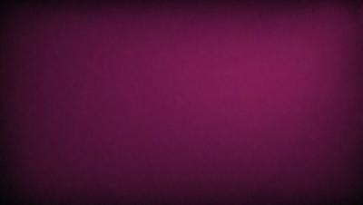 The primary subject of the image is a purple wall. The setting is a room with a purple wall, and the visual style is a close-up of the wall. The colors and mood of the image are predominantly purple, creating a calm and serene atmosphere.