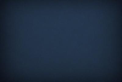 The primary subject of the image is a dark blue sky. The setting is a vast, open space with no visible landmarks or objects. The visual style is a simple, monochromatic representation of the sky. The colors and mood convey a sense of calmness and tranquility.