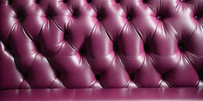 The primary subject of the image is a purple leather couch with a purple velvet cushion. The setting is a room with a purple wall, and the visual style is a close-up of the couch. The colors and mood of the image are predominantly purple, creating a cozy and inviting atmosphere.