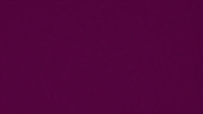 The primary subject of the image is a purple wall. The setting is a room with a purple wall, and the visual style is a close-up of the wall. The colors and mood of the image are predominantly purple, creating a calm and serene atmosphere.