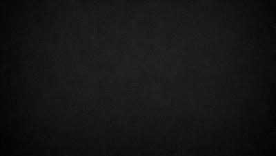 The primary subject of the image is a black background. The setting is a dark, empty space with no visible objects or elements. The visual style is a simple, monochromatic design. The colors and mood are predominantly dark and moody, creating a sense of mystery or drama.