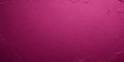 The primary subject of the image is a pink wall with a rough texture. The setting is a room with a pink background. The visual style is a close-up of the pink wall, which gives a sense of depth and texture. The dominant colors are pink, and the overall atmosphere is warm and inviting.