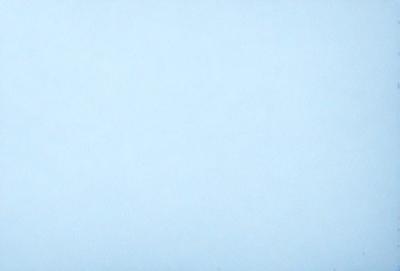 The primary subject of the image is a large, empty, and blue sky. The setting is a vast, open space with no visible landmarks or objects. The visual style is a natural, outdoor scene with a focus on the sky. The colors and mood are predominantly blue, creating a calm and serene atmosphere.