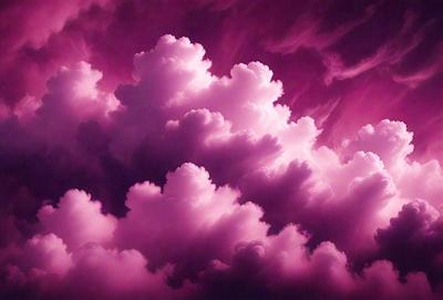 The primary subject of the image is a cloudy sky with pink clouds. The setting is a purple sky, which creates a unique and visually striking backdrop. The visual style of the image is a combination of photo and digital art, as it appears to be a photo of a painting or a digital illustration. The colors and mood of the image are predominantly pink, giving it a warm and serene atmosphere.