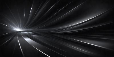The primary subject of the image is a tunnel, which is a dark and narrow passage. The setting is a black background, which emphasizes the tunnel's shape and structure. The visual style is a black and white photo, giving the image a classic and timeless appearance. The colors and mood are predominantly dark and moody, creating a sense of depth and mystery.
