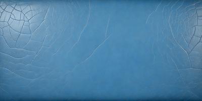 The primary subject of the image is a blue surface, possibly a piece of fabric or a wall. The setting is a room with a blue background, and the visual style appears to be a photo. The colors and mood of the image are predominantly blue, creating a calm and serene atmosphere.