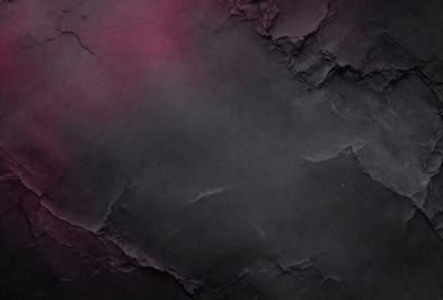The primary subject of the image is a black and purple wall. The setting is a dark room with a black background. The visual style is a close-up of the wall, showcasing its texture and color. The dominant colors are black and purple, creating a moody and dramatic atmosphere.