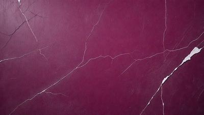 The primary subject of the image is a maroon leather surface with a purple hue. The setting is a room with a purple wall, and the visual style is a close-up of the leather surface. The colors and mood of the image are warm and inviting, with the purple and maroon tones creating a cozy atmosphere.