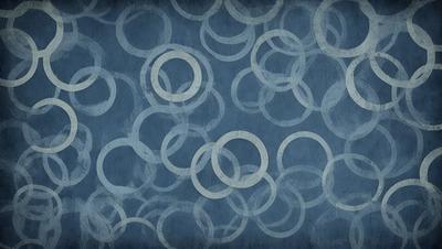 The primary subject of the image is a blue background with a pattern of white circles. The setting appears to be a wall or a surface with a blue color. The visual style of the image is a combination of a photo and a digital art, illustration, or drawing. The dominant colors are blue and white, creating a calm and soothing atmosphere.