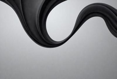 The primary subject of the image is a black and white photo of a curved, flowing line. The setting is a white background, which provides a clean and minimalist appearance. The visual style is a black and white photo, giving it a classic and timeless feel. The colors and mood of the image are predominantly black and white, creating a sense of elegance and sophistication.