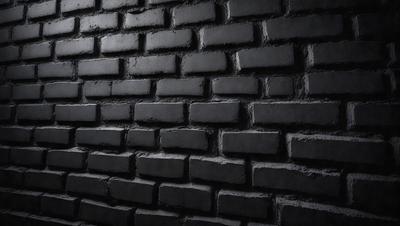 The primary subject of the image is a brick wall. The setting is a dark room, and the visual style is a black and white photo. The dominant colors are black and white, creating a moody atmosphere.