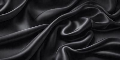 The primary subject of the image is a close-up of a black fabric, possibly a piece of clothing or a curtain. The setting is a dark background, which emphasizes the fabric's texture and pattern. The visual style is a black and white photo, giving the image a classic and timeless appearance. The colors and mood are predominantly dark and moody, with the black fabric serving as the focal point of the image.