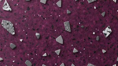 The primary subject of the image is a purple countertop with various shapes and sizes of rocks or stones on it. The setting is a countertop, and the visual style appears to be a combination of a photo and digital art. The dominant colors are purple and various shades of gray, creating a moody and unique atmosphere.