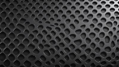 The primary subject of the image is a black and white patterned surface, which appears to be a black background with a pattern of holes or dots. The setting is a close-up of the pattern, showcasing the intricate details of the design. The visual style is a combination of a photo and a digital art, illustration, or drawing, as the pattern is created through a combination of these techniques. The colors and mood of the image are predominantly black and white, giving it a classic and timeless appearance.