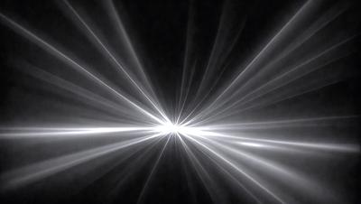 The primary subject of the image is a bright light source, which appears to be a light bulb or a light source in a dark room. The light source is surrounded by a bright, white, and shiny glare, creating a visually striking scene. The setting is a dark room, and the visual style is a close-up of the light source, emphasizing its brightness and intensity. The colors and mood of the image are predominantly white and bright, creating a sense of energy and intensity.