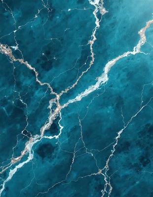 The primary subject of the image is a blue and white marble tile. The setting is a blue and white marble tile wall, which serves as the background. The visual style is a close-up of the marble tile, showcasing its intricate patterns and textures. The dominant colors are blue and white, creating a serene and elegant atmosphere.