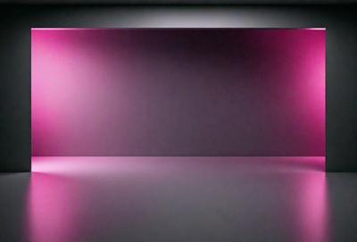 The primary subject of the image is a large, pink wall. The setting is a dark room, and the visual style appears to be a photo. The dominant colors are pink and purple, creating a warm and inviting atmosphere.