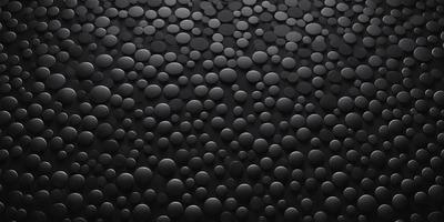 The primary subject of the image is a black background with a pattern of white circles. The setting is a dark room, and the visual style is a close-up of the circles. The dominant colors are black and white, creating a moody atmosphere.