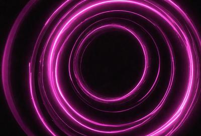 The primary subject of the image is a pink circle with a purple hue. The circle appears to be a neon sign or a light source, possibly illuminating a dark background. The setting or background of the image is a black surface, which contrasts with the bright colors of the circle. The visual style of the image is a combination of digital art and illustration, creating a unique and eye-catching design. The colors and mood of the image are vibrant and energetic, with the pink and purple hues evoking a sense of warmth and creativity.