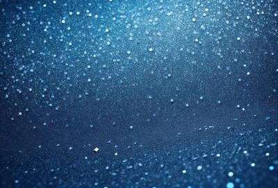 The primary subject of the image is a blue sky filled with glittering stars. The setting is a night sky, and the visual style is a photo. The colors and mood of the image are predominantly blue and serene, creating a peaceful and tranquil atmosphere.