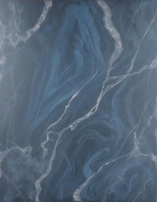 The primary subject of the image is a blue marble tile with a pattern of swirls and waves. The setting is a bathroom, as indicated by the presence of the marble tile. The visual style is a close-up of the tile, showcasing its intricate design. The dominant colors are blue and white, creating a calm and soothing atmosphere.