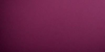 The primary subject of the image is a large, purple wall. The setting is a room with a red background, which creates a striking contrast with the purple wall. The visual style is a close-up of the wall, showcasing its color and texture. The dominant colors are purple and red, creating a bold and vibrant atmosphere.