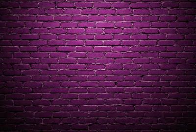 The primary subject of the image is a purple brick wall. The setting is a brick wall, and the visual style is a photo. The dominant colors are purple and red, creating a bold and striking atmosphere.