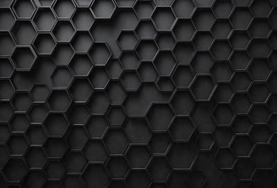 The primary subject of the image is a black and white patterned surface, which appears to be a black background with a geometric pattern. The setting is a dark room, and the visual style is a close-up of the pattern. The dominant colors are black and white, and the overall atmosphere is one of intrigue and mystery.