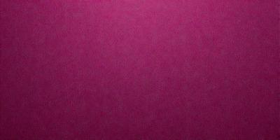 The primary subject of the image is a close-up of a pink fabric. The setting is a pink background, which creates a visually striking contrast with the fabric. The visual style is a photo, capturing the details of the pink fabric. The colors and mood of the image are predominantly pink, giving it a warm and inviting atmosphere.