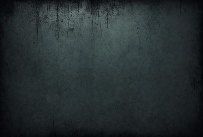 The primary subject of the image is a large, dark blue wall with a textured surface. The setting is a room with a blue background, and the visual style appears to be a photo. The dominant colors are blue and black, creating a moody atmosphere.