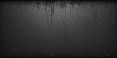The primary subject of the image is a black surface with a few white spots. The setting is a dark room, and the visual style appears to be a photo. The colors and mood of the image are predominantly dark and moody, with the black surface and white spots creating a contrasting effect.