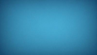 The primary subject of the image is a large, open, and empty blue sky. The setting is a vast, cloudless expanse, with no visible landmarks or objects. The visual style is a realistic representation of the sky, with no indication of digital manipulation or artistic elements. The colors and mood of the image are predominantly blue, conveying a sense of calmness and tranquility.