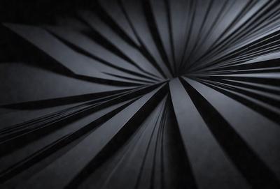 The primary subject of the image is a black and white pattern, which appears to be a close-up of a spiral or a hole. The setting is a dark background, which contrasts with the pattern. The visual style is a combination of a photo and a digital art, illustration, or drawing. The colors are predominantly black and white, giving the image a classic and timeless feel.
